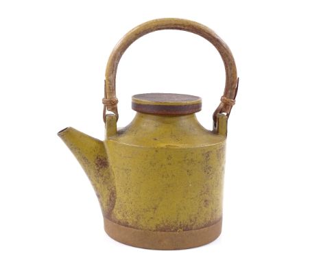 Robin Welch, Studio pottery teapot with cane handle, incised signature, height to lid 17.5cm 