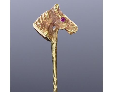 A 9ct gold ruby figural horsehead stick pin, maker's marks C and F, hallmarks London 1977, overall length 60mm, 2gCondition R