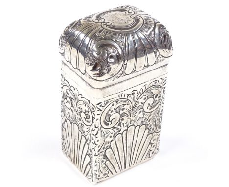 An Edwardian rectangular silver dome-top tea caddy, relief embossed fluted and foliate decoration, gilt interior, by Army &am