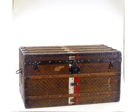 A Louis Vuitton wood and metal-bound Vintage travelling trunk, original chequer design ground with original label inside, 90c