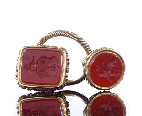 2 19th century unmarked yellow metal carnelian intaglio seal fobs, both depicting rampant lion holding sun, with relief cast 