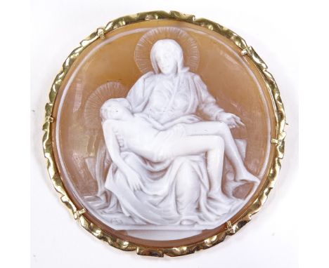 A relief carved circular cameo shell panel pendant/brooch, depicting Madonna and Christ, 14ct frame, by Giovanni Apa, brooch 