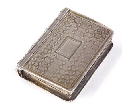 A William IV silver novelty book vinaigrette, engine turned decoration with vacant cartouche, ribbed spine and gilt interior 