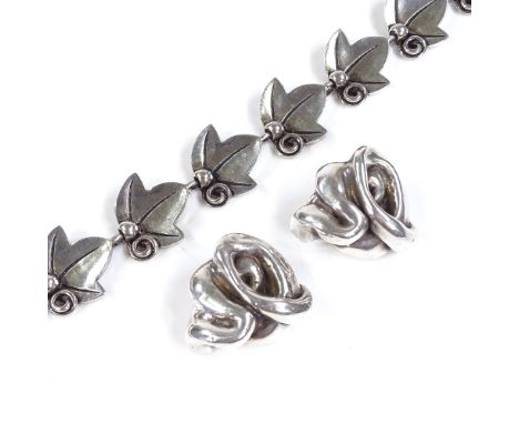 A pair of sterling silver abstract clip-on earrings, maker's marks GLW, length 40mm, and a French silver plated leaf necklace