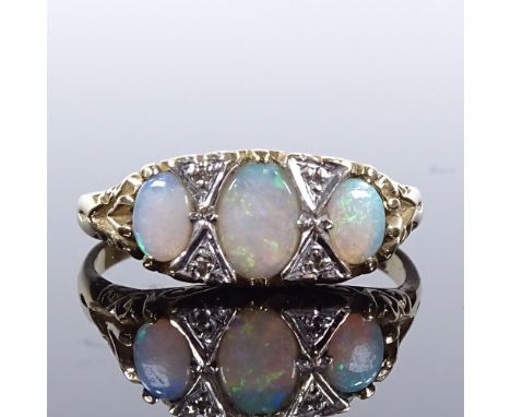 A 9ct gold 7-stone opal and diamond half-hoop ring, scroll engraved bridge and shoulders, setting height 8.1mm, size T, 3.8gC