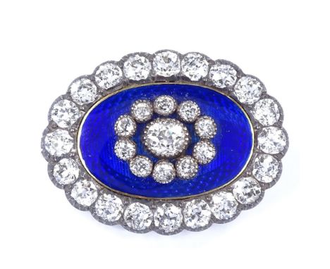 An Antique unmarked gold royal blue enamel and diamond cluster oval pendant / brooch, central engine turned guilloche enamel 