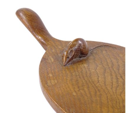 Robert Mouseman Thompson, oak cheeseboard with handle, mid-20th century, length 36cm 