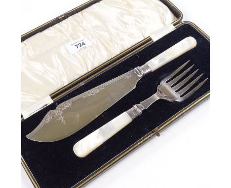 A George V fish serving set, mother-of-pearl handles with silver necks, by C H Beatson, hallmarks Sheffield 1932, and plated 