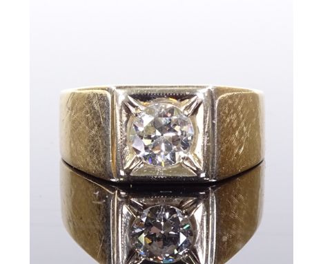 A 14ct gold 0.85ct solitaire diamond gypsy ring, setting height 9.6mm, size S, 6.4gCondition Report: Very good bright, white 