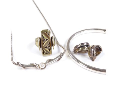 A Soren Borup Danish sterling silver slave bangle, a sterling pearl necklace, vermeil silver ring and a pair of sterling clip