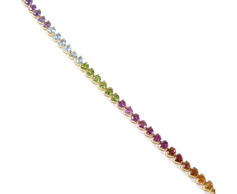 An 18ct gold heart-cut multi-gem line bracelet, including amethyst, topaz, peridot and citrines, bracelet length 18cm, 14.9gC