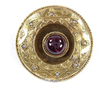 An unmarked yellow metal foil back cabochon tourmaline and split-pearl circular brooch in rope twist surround, brooch diamete