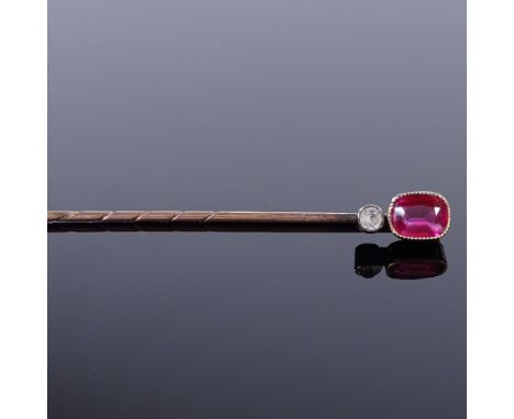 An Austro-Hungarian high carat gold ruby and paste stick pin, dog head mark in between A and 4, Vienna factory mark and maker