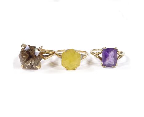 3 9ct gold stone set rings, comprising fire opal, smoky quartz and amethyst, 12.8g total (3)Condition Report: Smoky quartz ri