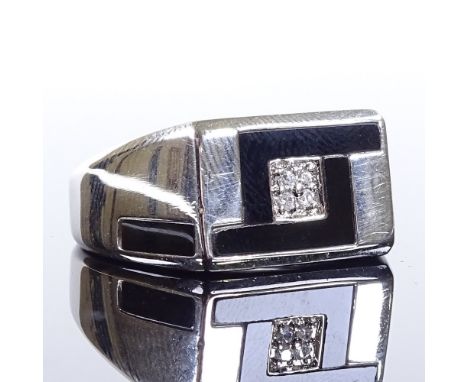 A modern 9ct white gold diamond cluster onyx signet ring, onyx panel shoulders, maker's marks CLE, hallmarks Birmingham 2005,