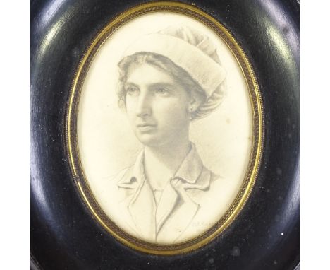 H F Richardson, First War Period pencil portrait of a nurse, signed and dated 1917, framed, overall dimensions 9" x 8" 