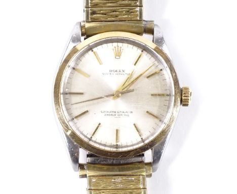 ROLEX - a stainless steel Oyster Perpetual automatic wristwatch, circa 1963, ref. 1002, silvered dial with gilt baton hour ma