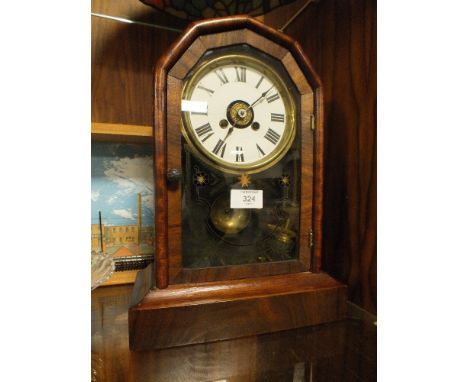 A VINTAGE MAHOGANY MANTLE CLOCK 