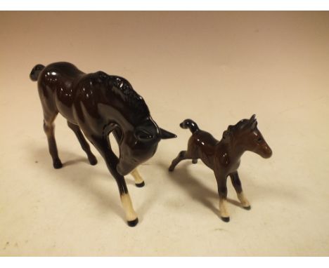 TWO ROYAL DOULTON CERAMIC FOALS 