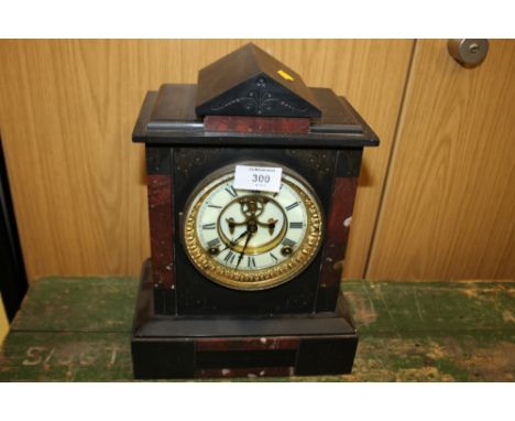 A SLATE AND MARBLE MANTLE CLOCK 