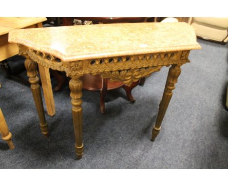 A MARBLE TOPPED GILT WOOD CONSOLE TABLE 