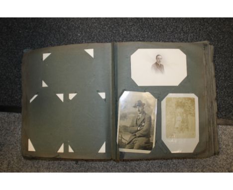 A VINTAGE POSTCARD ALBUM