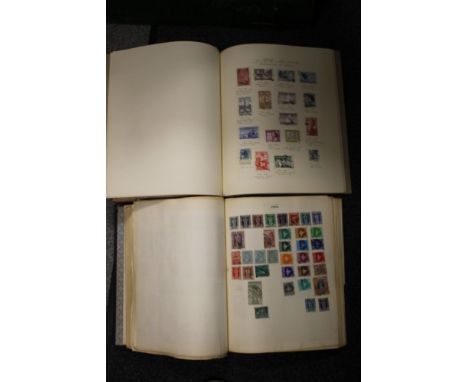 TWO VINTAGE STAMP ALBUMS 