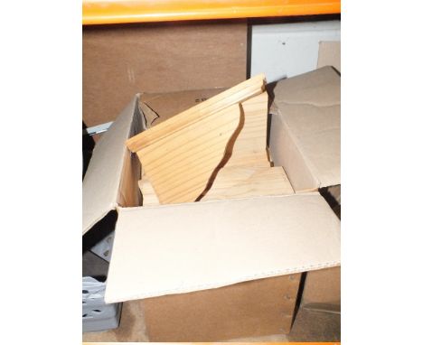 A BOX OF PINE SHELF SUPPORTS