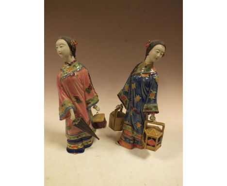 TWO ORIENTAL CERAMIC LADY FIGURES WITH BASKETS 