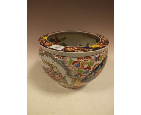 AN ORIENTAL CERAMIC FISH BOWL 
