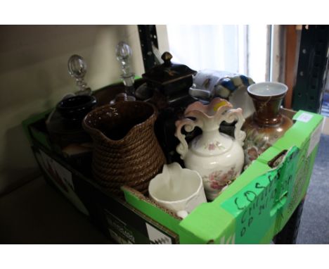 A BOX OF GLASS AND CERAMIC JUGS AND VASES TO INCLUDE TWO DECANTERS