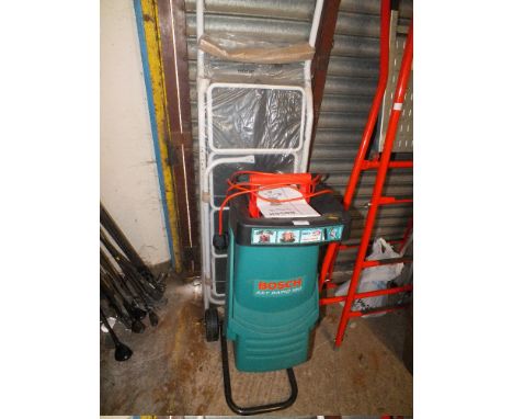 A BOSCH AXT RAPID 180  CHIPPER PLUS A SET OF STEP LADDERS