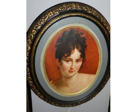 20th century Continental school, portrait of a lady, lithiograph, feigned to oval, within an ornately carved giltwood frame. 