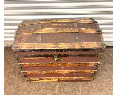 Antique dome top trunk, approx h24 X w30 X d20 inches. 