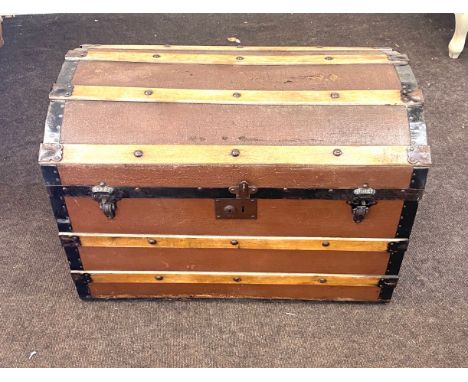Dome top trunk, which is approximately 30 inches in length, 18 in width, 21 inches in height. 