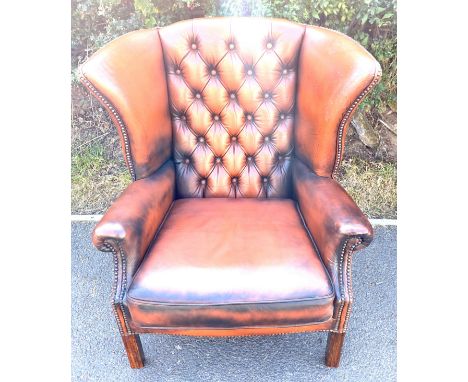 Brown leather vintage stubbed back fireside chair 