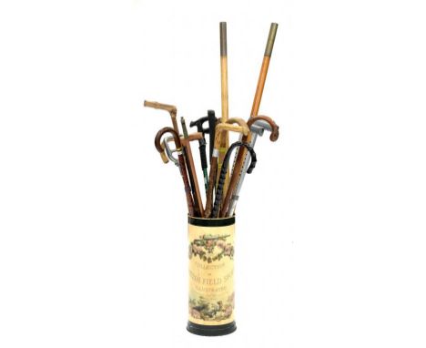 A QUANTITY OF SHOOTING AND WALKING STICKS, TO INCLUDE A SILVER MOUNTED GADGET CANE INCORPORATING A HORSE MEASURING STICK, EAR