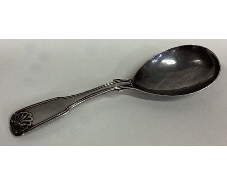 A silver fiddle pattern caddy spoon. London. By JW. Approx. £20 - £30.