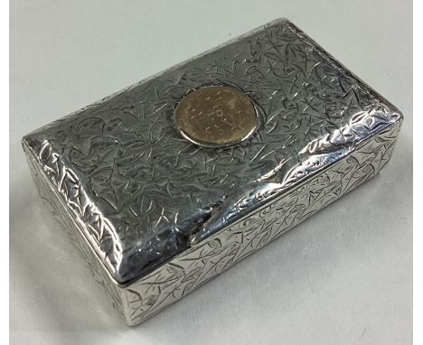 A Victorian silver snuff box with gold plaque to lid. Birmingham 1884. By Hilliard & Thomason. Approx. 34 grams. Est. £80 - £