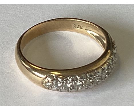 A 9 carat diamond set ring. Approx. 34 grams. Est. £50 - £80.
