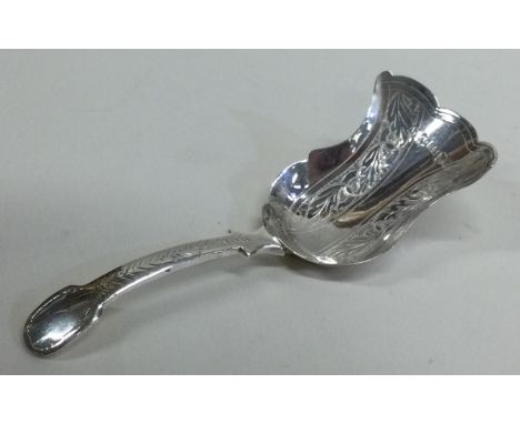 A good Georgian silver bright-cut caddy spoon with leaf and vine decoration. Birmingham. Approx. 10 grams. Est. £50 - £80.