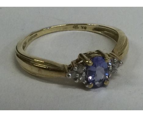 A 9 carat diamond set six stone ring. Approx. 2 grams. Est. £30 - £40.