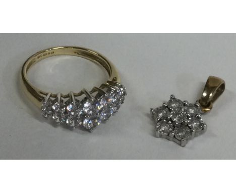 A 14 carat gold two row ring together with matching pendant. Approx. 4 grams. Est. £60 - £80.
