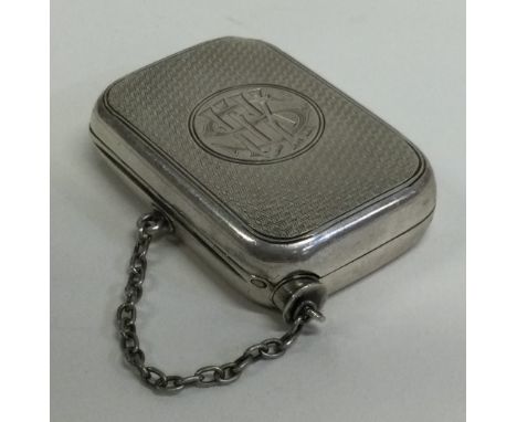 An unusual engine turned silver travelling vesta case on suspension chain. London. By George Adams. Approx. 39 grams. Est. £6