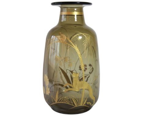 A superb Daum &amp; Nancy French art deco amber tinted vase depicting big cats and monkeys amongst etched foliage, (H: 30cm) 