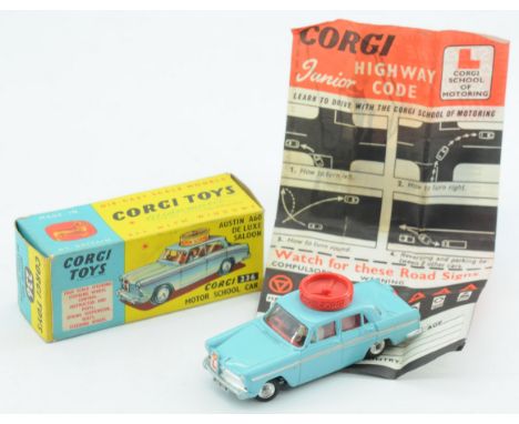 Corgi Toys 236 Austin A60 "Motor School" - Light blue body with silver trim and side flashes, red interior and roof turning d