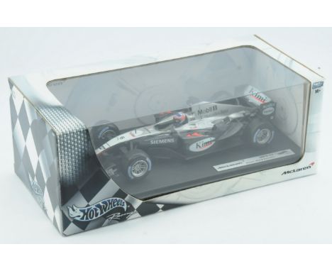 Hot Wheels Racing McLaren MP 4/19 Kimi Raikkonen 1/18 Scale - black, silver, racing number 6 with seated driver, mounted on b