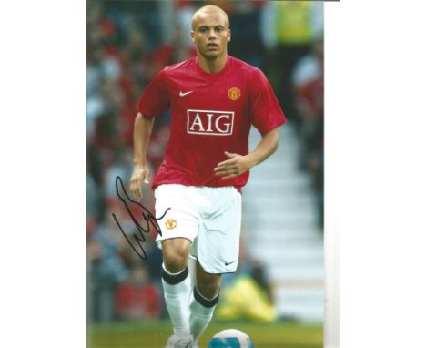 Football Wes Brown 8 x 12 inch signed colour photo pictured in action for Manchester United. Good Condition. All autographs a