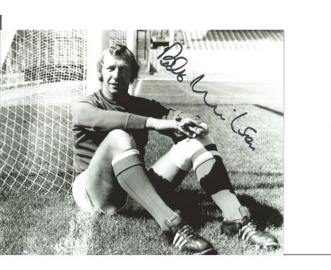 Football Bob Wilson 8x10 signed black and white photo pictured during his playing days with Arsenal F. C. Good Condition. All