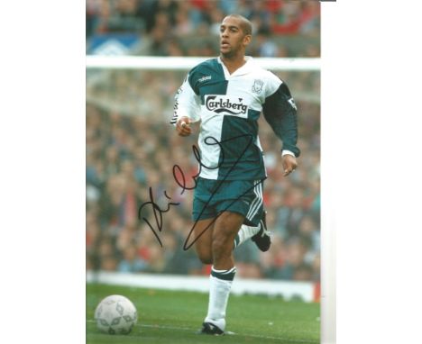 Phil Babb Liverpool Signed 12 x 8 inch football photo. Good Condition. All autographs are genuine hand signed and come with a